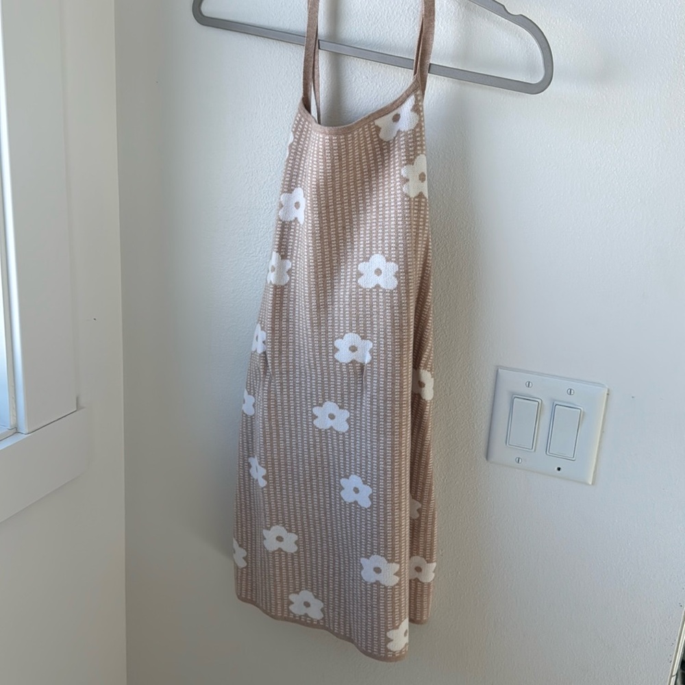 Worn once daisy  dress in a neutral pallet